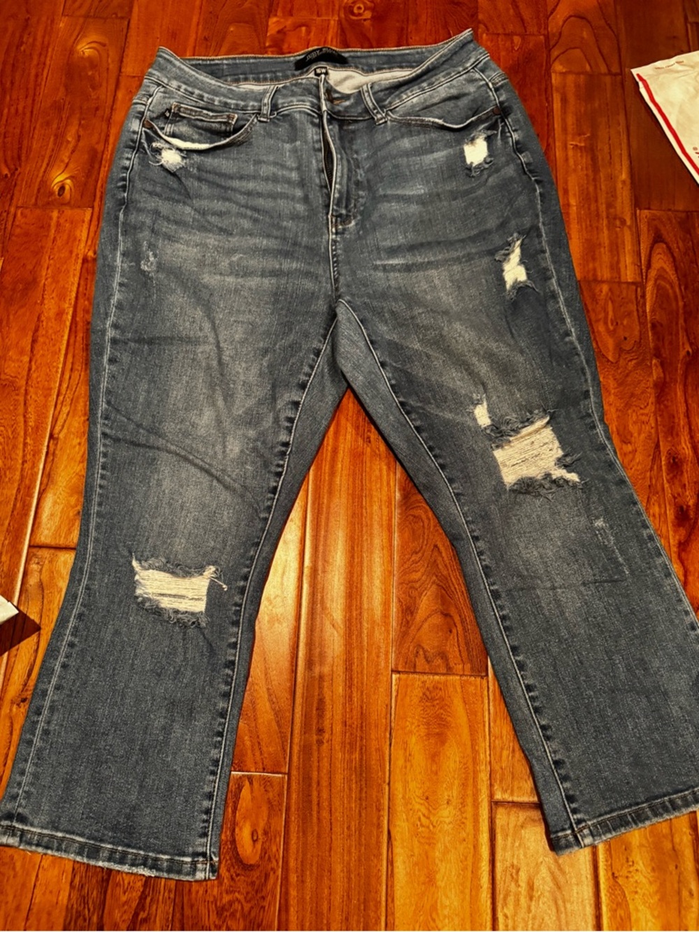 Judy Blue Medium Blue distressed pocket and legs